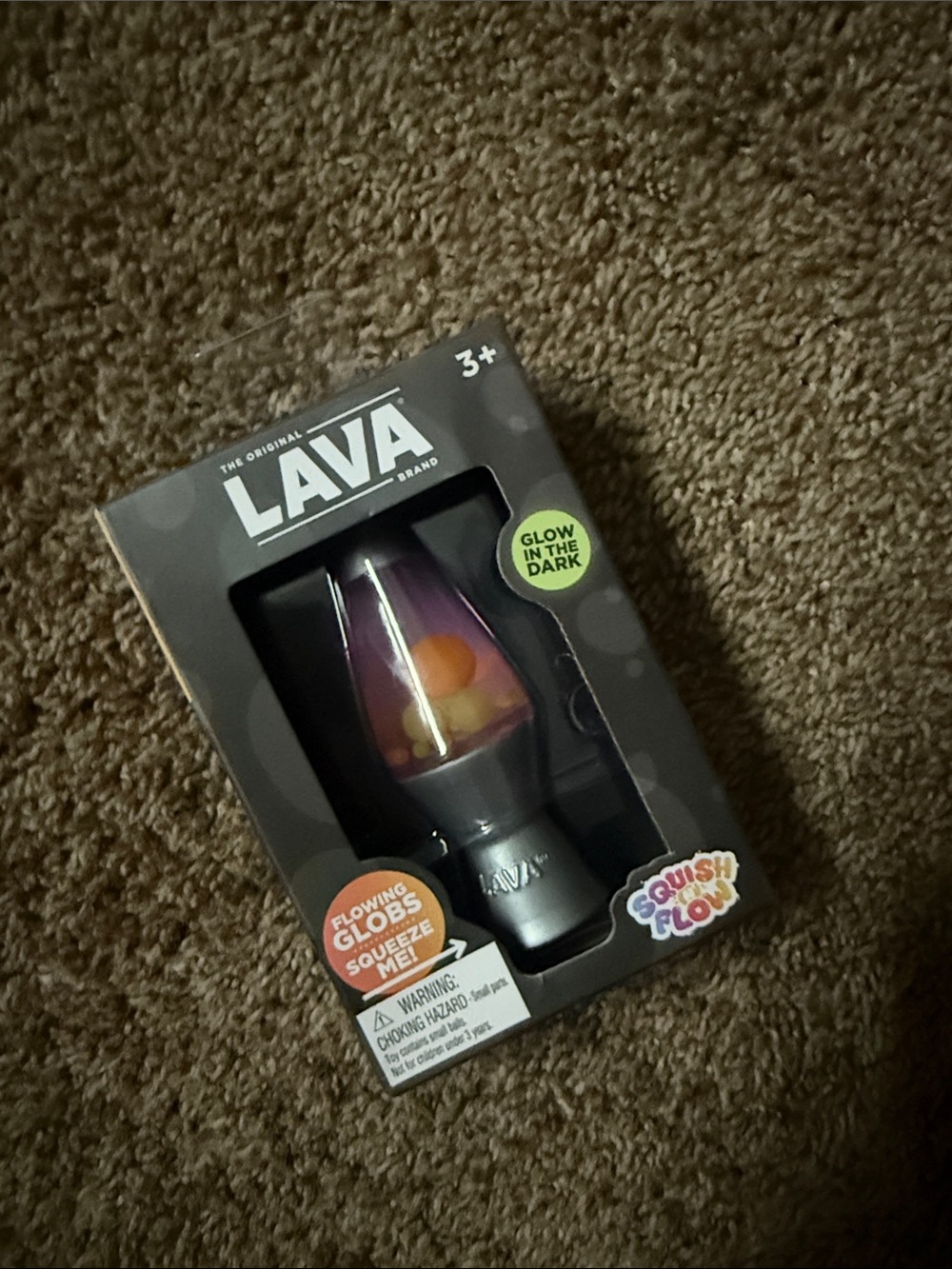 Rare squishy Glow-in-the-Dark Mini Lava Lamp - Purple/Orange